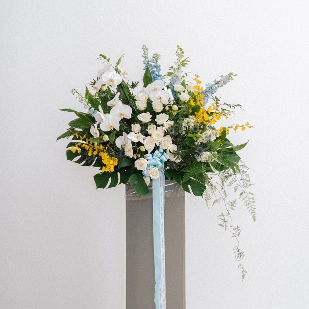 Lush Delphinium And Orchid Floral Stand