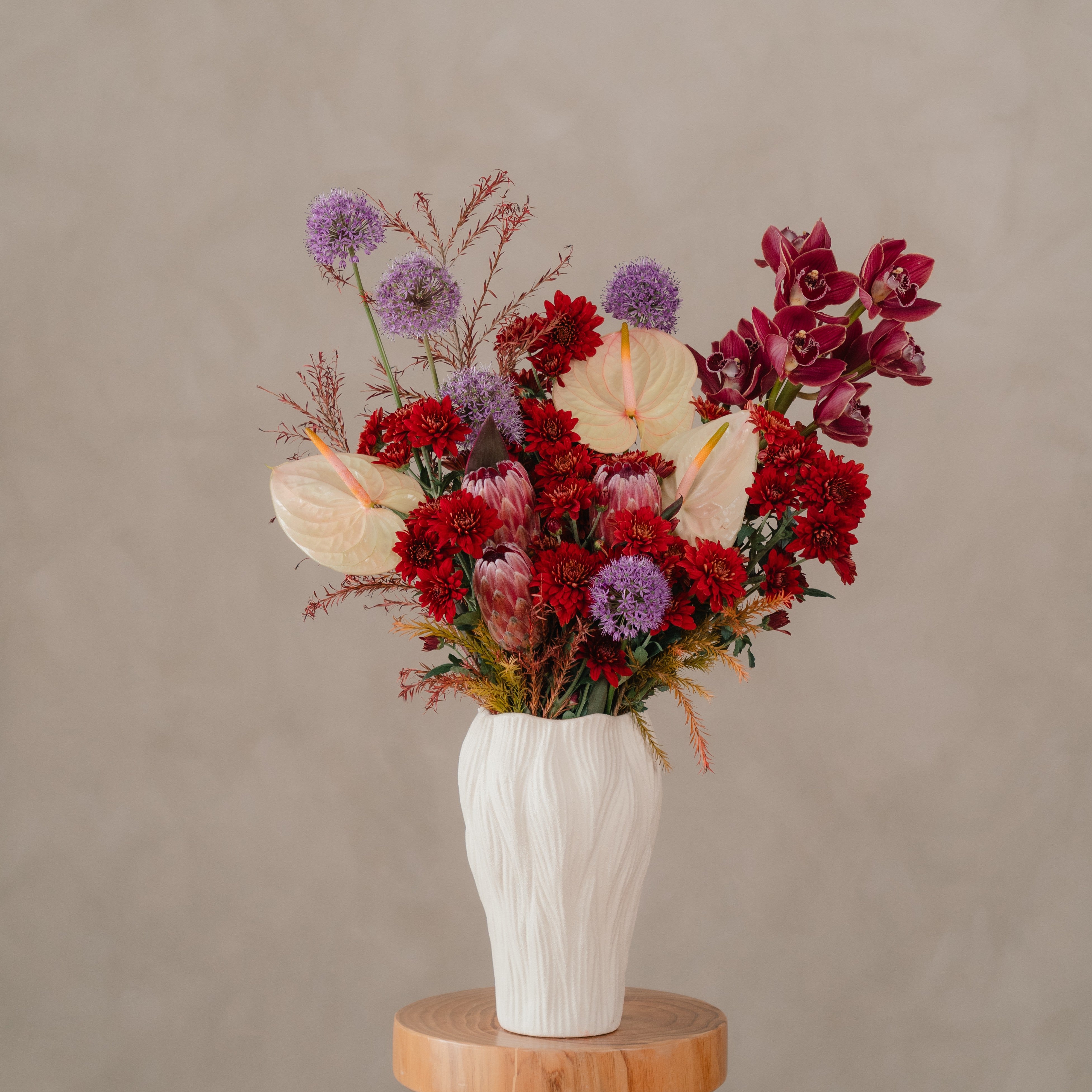 Cymbidium Orchid and Allium Vase Arrangement