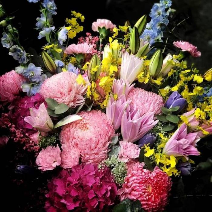 Double Petaled Lily And Delphinium Bouquet