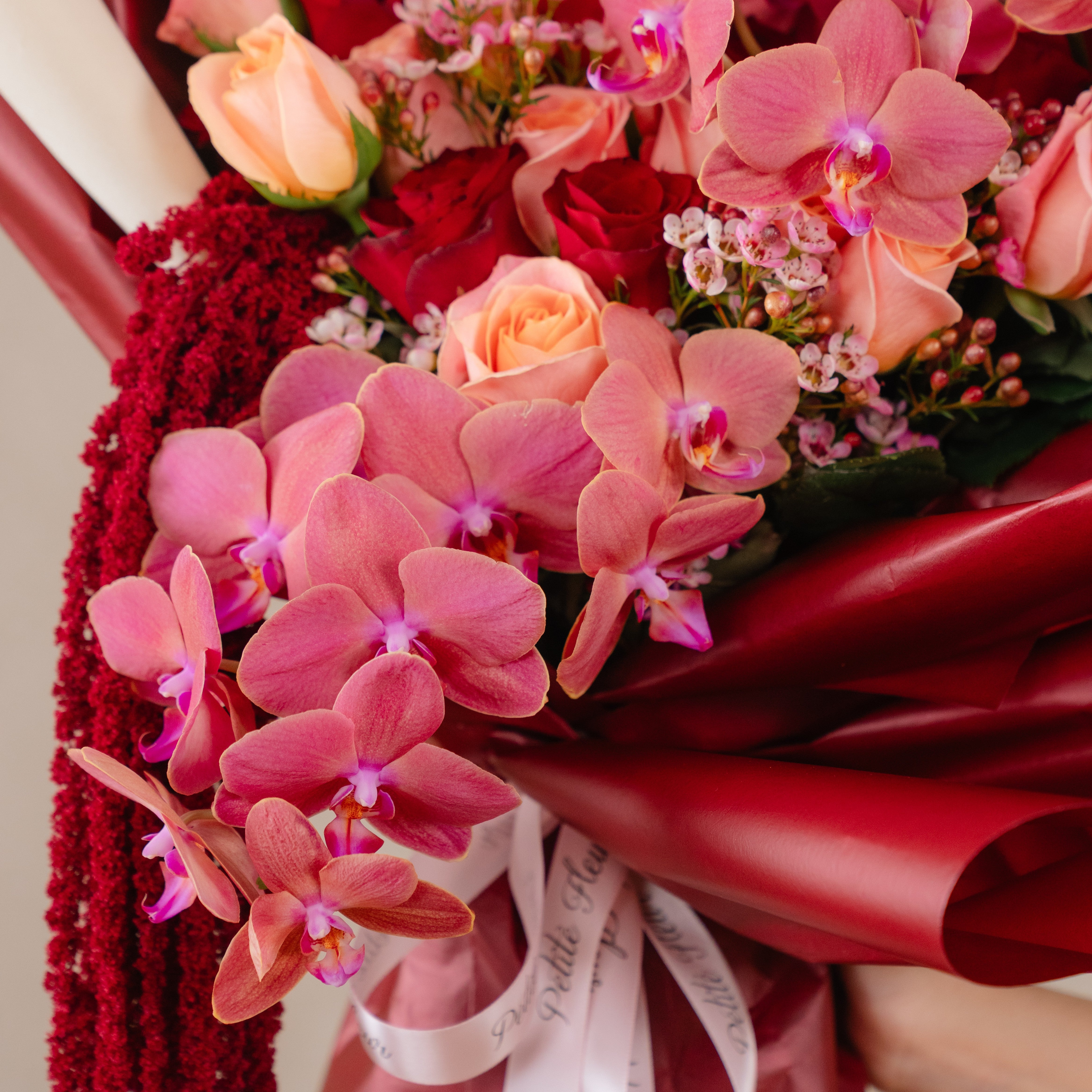 Crimson Elegance – Signature Orchid & Rose Bouquet